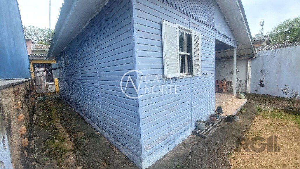 Casa à venda com 2 quartos, 100m², 2 vagas, Rua Itacurubi no bairro Vila Nova em Porto Alegre