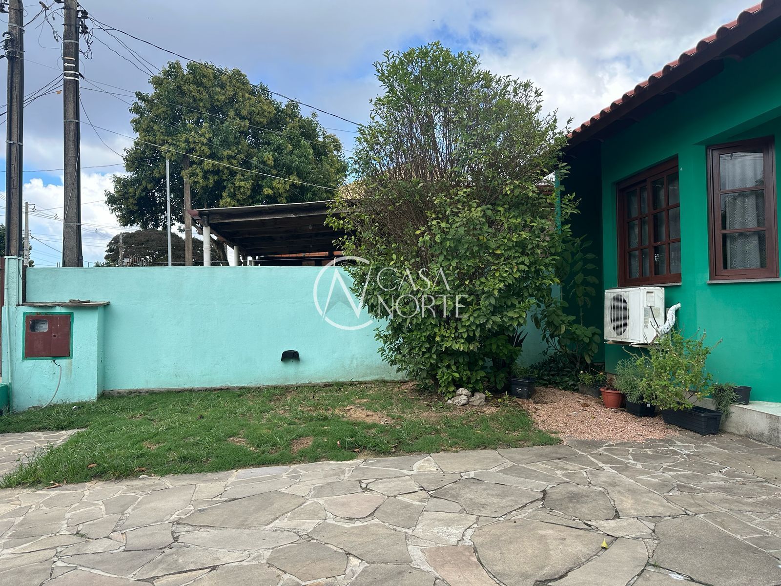 Casa à venda com 2 quartos, 98m², 2 vagas, Rua Lauro Motta Duarte no bairro Belém Novo em Porto Alegre