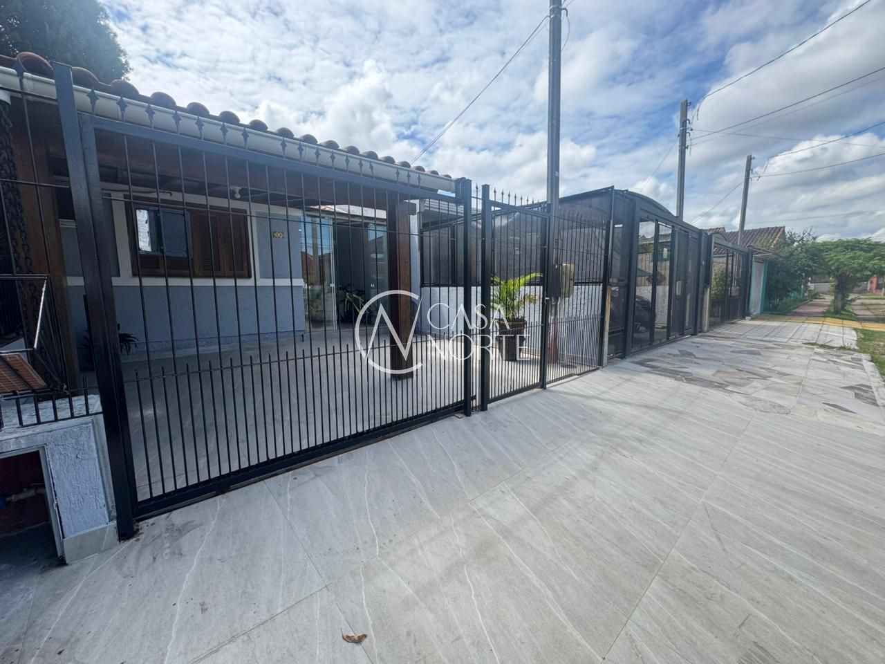 Casa à venda com 4 quartos, 89m², 2 vagas, Rua José Carlos Bohne no bairro Hípica em Porto Alegre