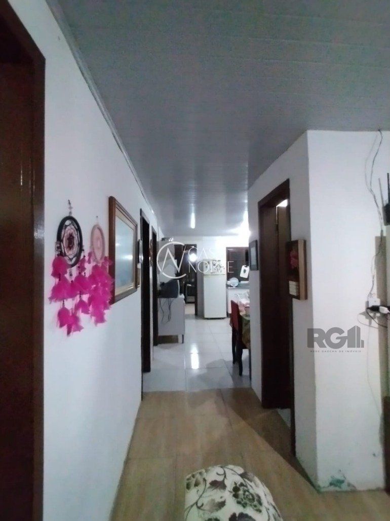 Casa à venda com 3 quartos, 60m², 1 vaga, Avenida Principal da Ponta Grossa no bairro Ponta Grossa em Porto Alegre