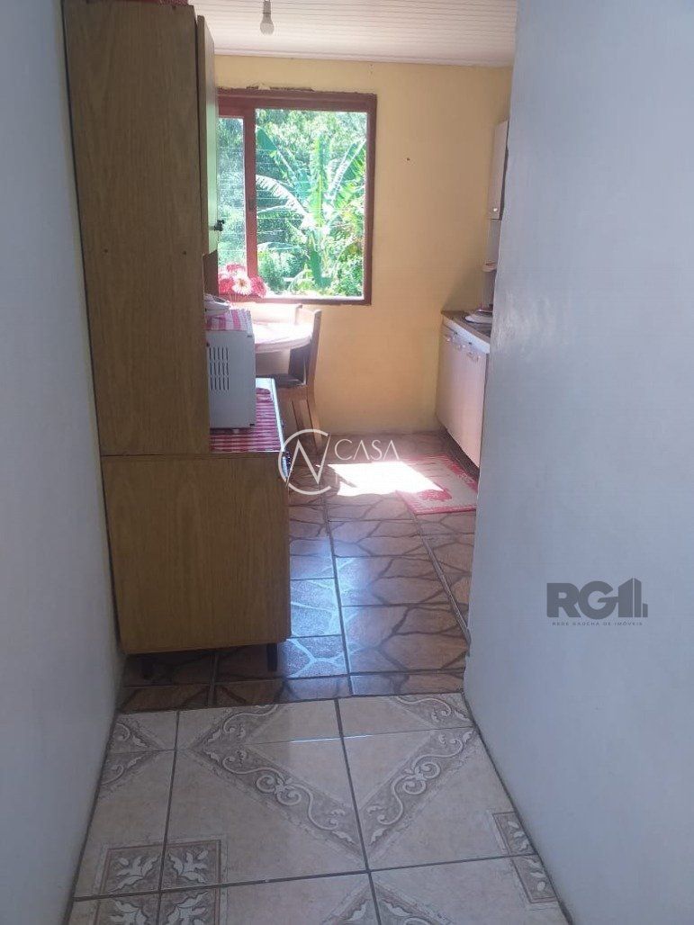 Casa à venda com 3 quartos, 136000m², 2 vagas, Estrada Chácara do Banco no bairro Restinga em Porto Alegre