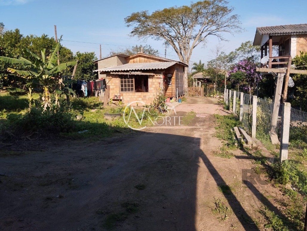 Casa à venda com 2 quartos, 560m², 2 vagas, Avenida Edgar Pires de Castro no bairro Lageado em Porto Alegre