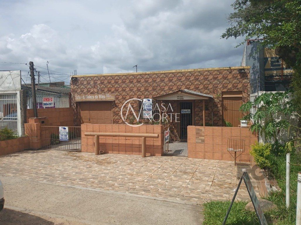 Casa à venda com 2 quartos, 400m², 4 vagas, Avenida Edgar Pires de Castro no bairro Restinga em Porto Alegre