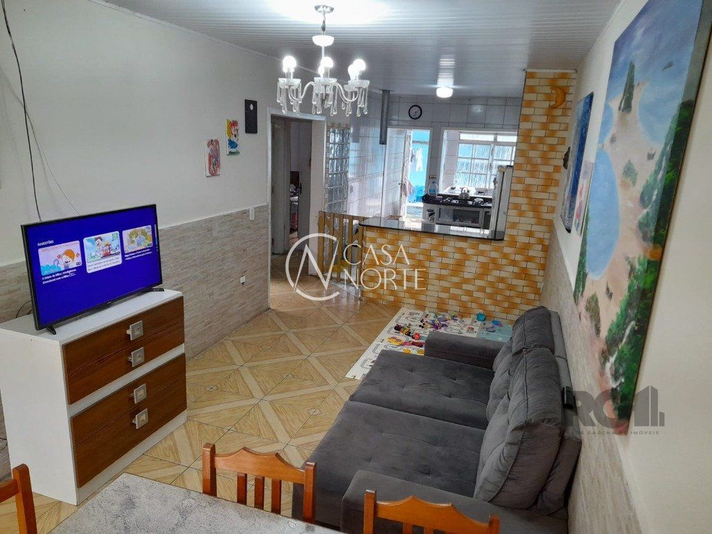 Casa à venda com 2 quartos, 93m², 2 vagas, Rua Brigadeiro Leonardo Teixeira Collares no bairro Vila Nova em Porto Alegre