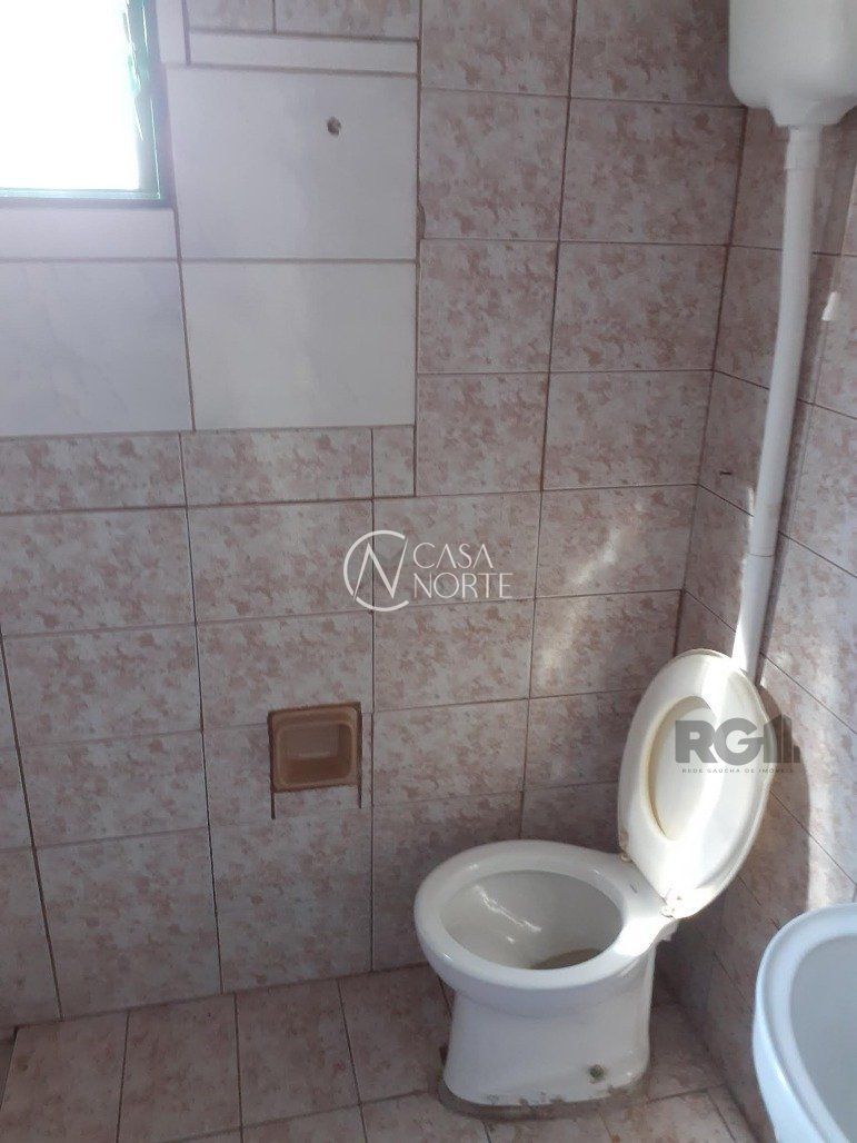 Casa à venda com 3 quartos, 125m², 3 vagas, Estrada Barro Vermelho no bairro Restinga em Porto Alegre