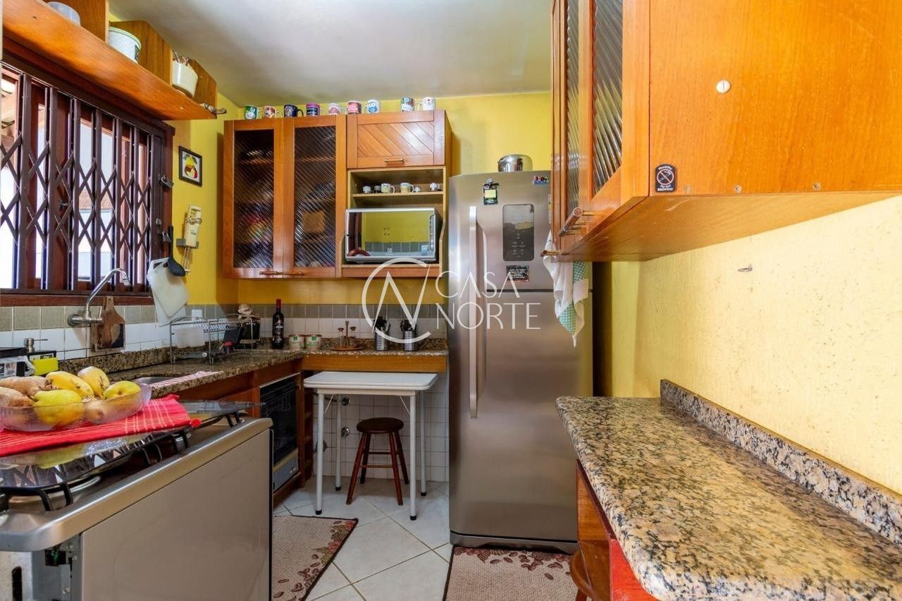 Casa à venda com 3 quartos, 111m², 2 vagas, Rua Rodolpho Espinoza no bairro Hípica em Porto Alegre