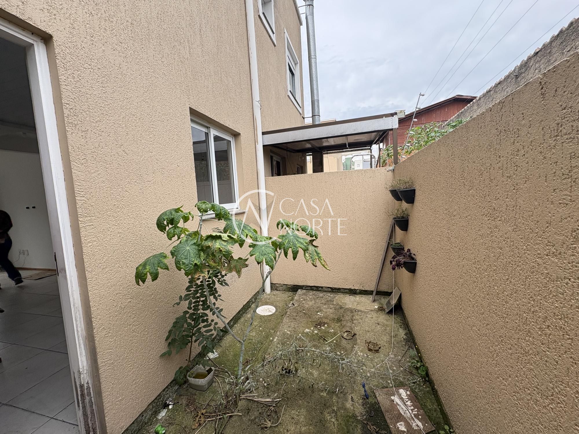 Casa de Condomínio à venda com 2 quartos, 82m², 1 vaga, Rua Capitão Pedroso no bairro Restinga em Porto Alegre