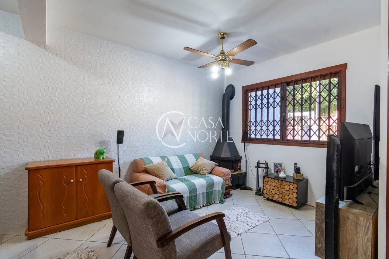 Casa à venda com 3 quartos, 111m², 2 vagas, Rua Rodolpho Espinoza no bairro Hípica em Porto Alegre