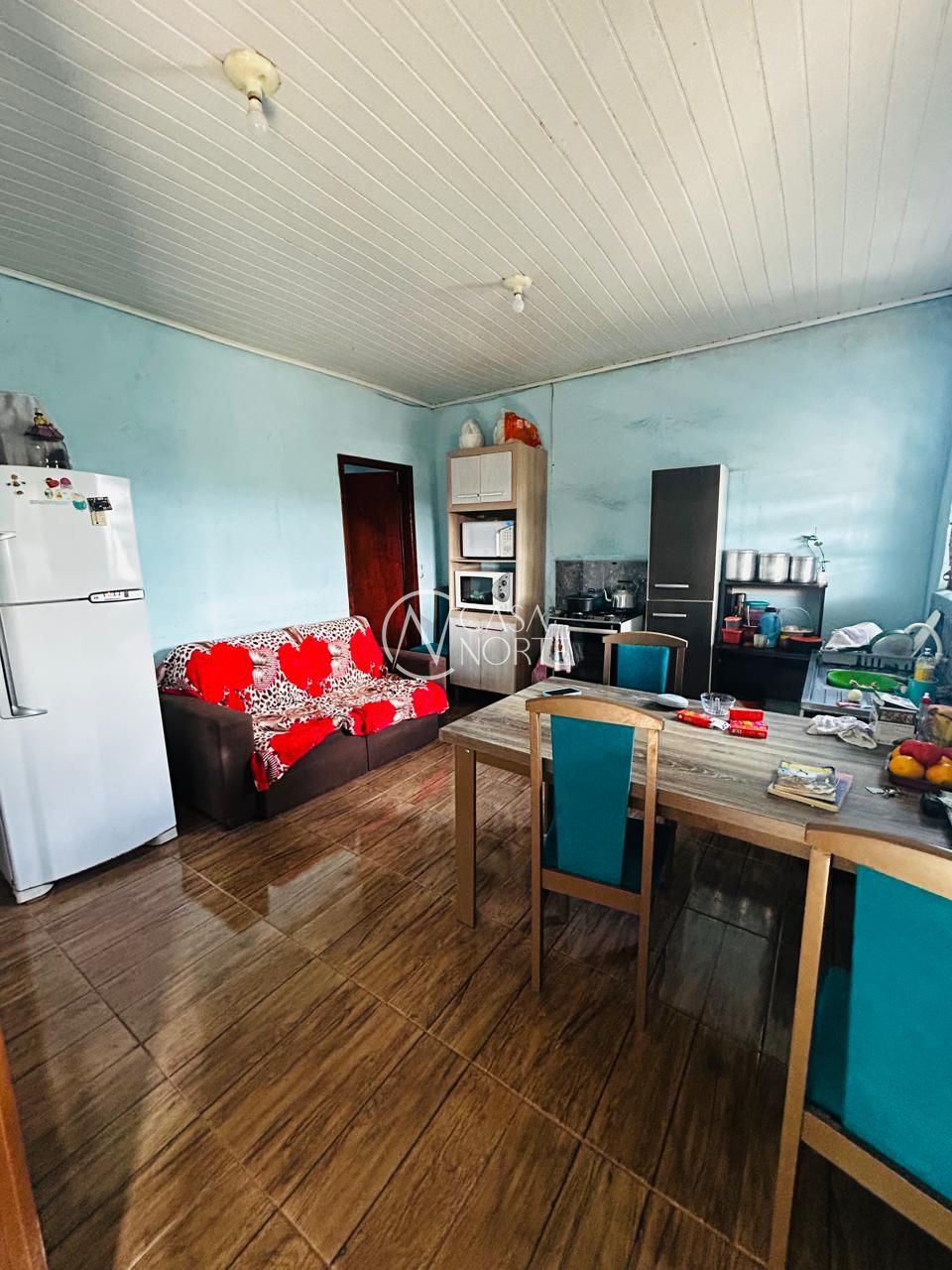 Casa à venda com 2 quartos, 102m², 1 vaga, Rua I no bairro Restinga em Porto Alegre