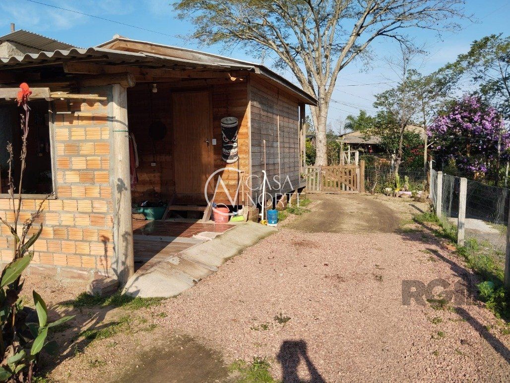 Casa à venda com 2 quartos, 560m², 2 vagas, Avenida Edgar Pires de Castro no bairro Lageado em Porto Alegre