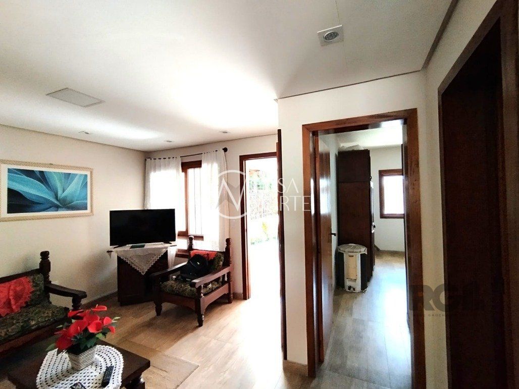 Casa de Condomínio à venda com 3 quartos, 210m², 1 suíte, 2 vagas, Rua Pau-Brasil no bairro Hípica em Porto Alegre