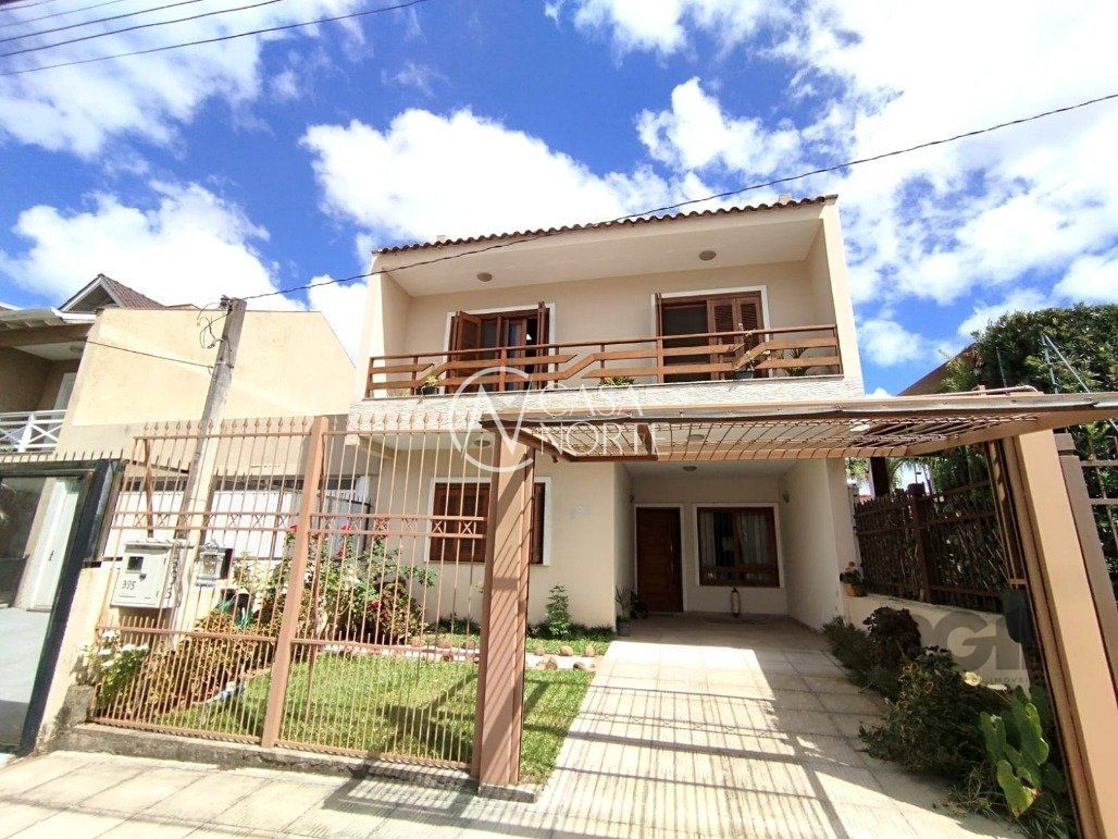 Casa de Condomínio à venda com 3 quartos, 210m², 1 suíte, 2 vagas, Rua Pau-Brasil no bairro Hípica em Porto Alegre