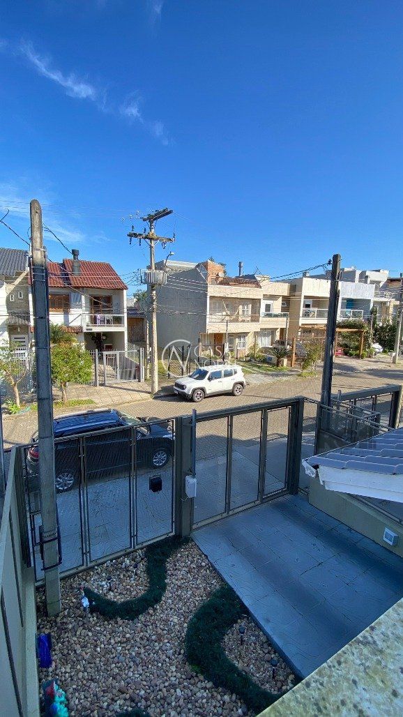 Casa à venda com 3 quartos, 138m², 1 suíte, 2 vagas, Rua Wilson Conceição Bona no bairro Hípica em Porto Alegre