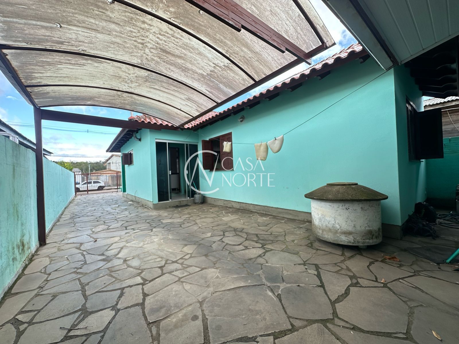 Casa à venda com 2 quartos, 98m², 2 vagas, Rua Lauro Motta Duarte no bairro Belém Novo em Porto Alegre