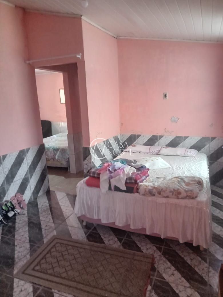 Casa à venda com 4 quartos, 199m², 2 vagas, Avenida Martinica no bairro Restinga em Porto Alegre