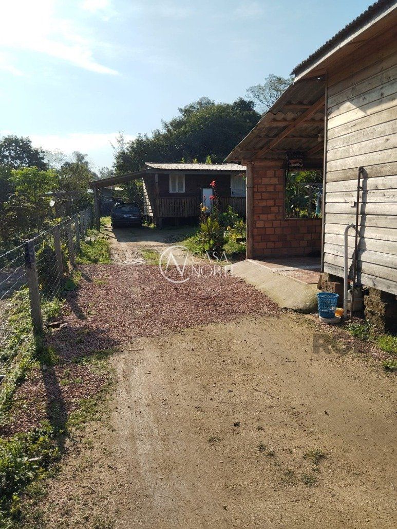 Casa à venda com 2 quartos, 560m², 2 vagas, Avenida Edgar Pires de Castro no bairro Lageado em Porto Alegre