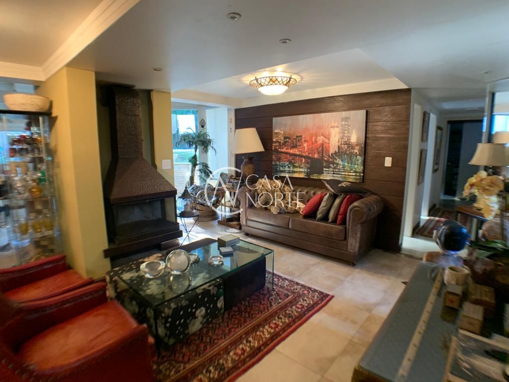 Casa à venda com 3 quartos, 420m², 1 suíte, 2 vagas, Rua Fernando Cunha no bairro Ipanema em Porto Alegre