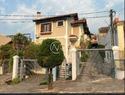 Casa de Condomínio à venda com 3 quartos, 151m², 1 suíte, 2 vagas, Padre João Batista Reus no bairro Tristeza em Porto Alegre
