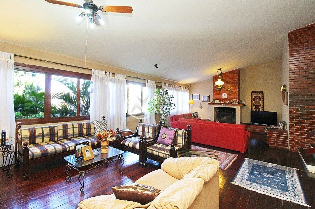 Casa à venda com 3 quartos, 252m², 1 suíte, 2 vagas, Rua Senador Annibal di Primio Beck no bairro Boa Vista em Porto Alegre