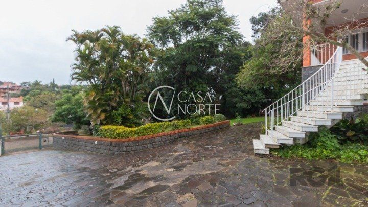 Casa à venda com 4 quartos, 611m², 2 suítes, 4 vagas, Avenida Pereira Passos no bairro Vila Assunção em Porto Alegre