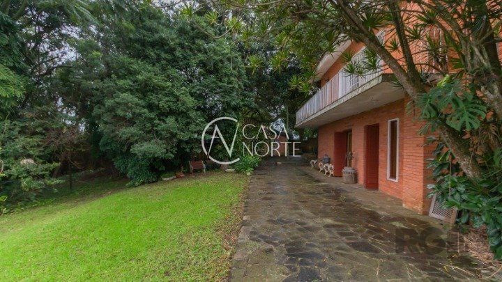 Casa à venda com 4 quartos, 611m², 2 suítes, 4 vagas, Avenida Pereira Passos no bairro Vila Assunção em Porto Alegre