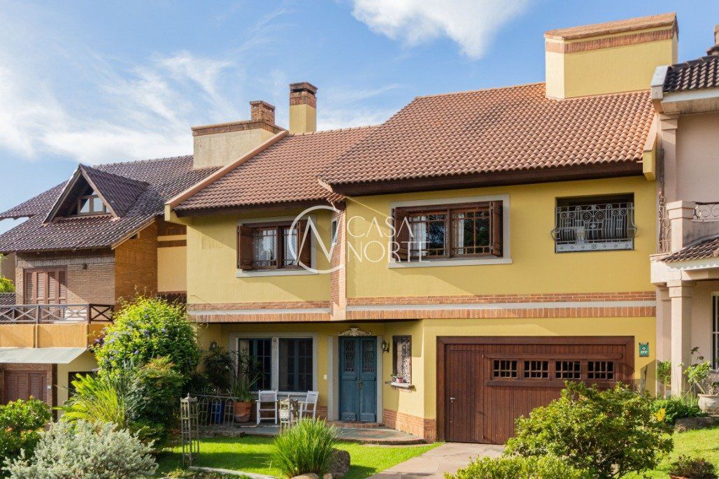 Casa de Condomínio à venda com 4 quartos, 340m², 2 suítes, 3 vagas, Rua Seival no bairro Vila Jardim em Porto Alegre