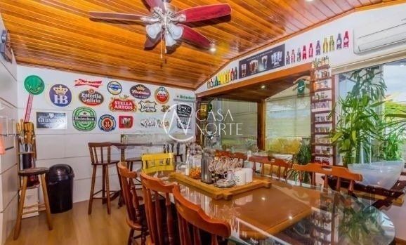 Casa à venda com 7 quartos, 470m², 2 suítes, 6 vagas, Rua Dona Oti no bairro Petrópolis em Porto Alegre