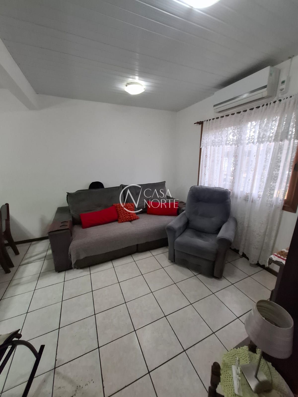 Casa à venda com 3 quartos, 58m², 2 vagas, Rua Darcy de Bastos Germann no bairro Hípica em Porto Alegre