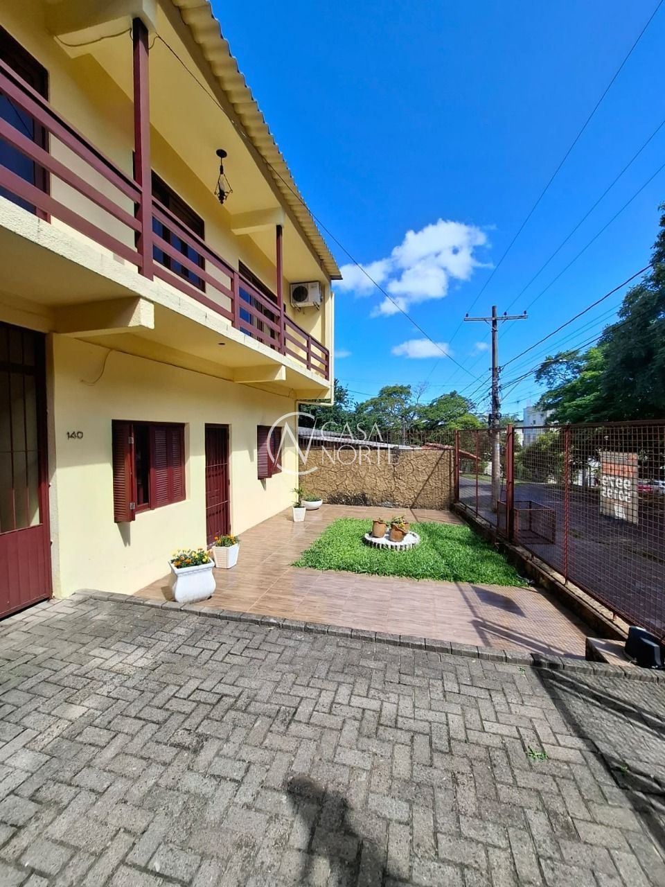 Casa à venda com 4 quartos, 254m², 4 vagas, Rua Ventos do Sul no bairro Vila Nova em Porto Alegre