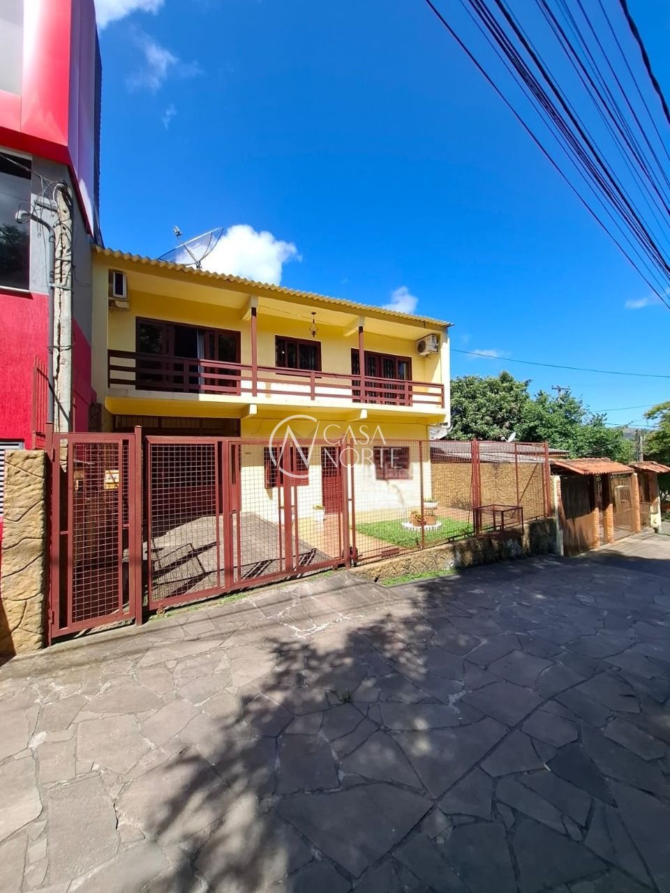 Casa à venda com 4 quartos, 254m², 4 vagas, Rua Ventos do Sul no bairro Vila Nova em Porto Alegre