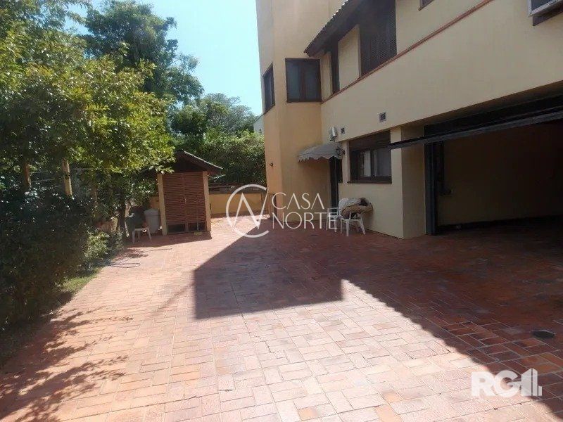 Casa de Condomínio à venda com 4 quartos, 450m², 4 suítes, 2 vagas, Avenida da Cavalhada no bairro Cavalhada em Porto Alegre