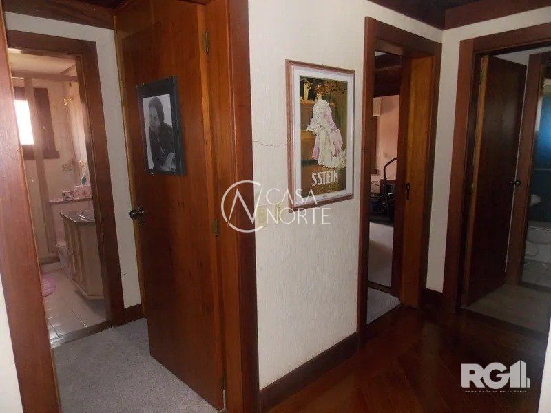 Casa de Condomínio à venda com 4 quartos, 450m², 4 suítes, 2 vagas, Avenida da Cavalhada no bairro Cavalhada em Porto Alegre