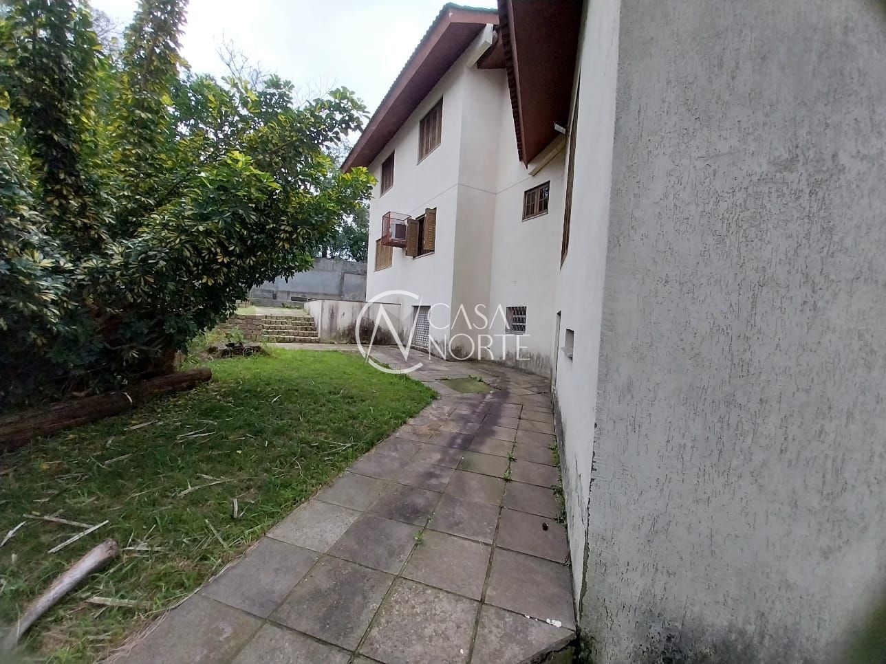 Casa à venda com 5 quartos, 304m², 2 vagas, Rua Banco do Comércio no bairro Santa Tereza em Porto Alegre