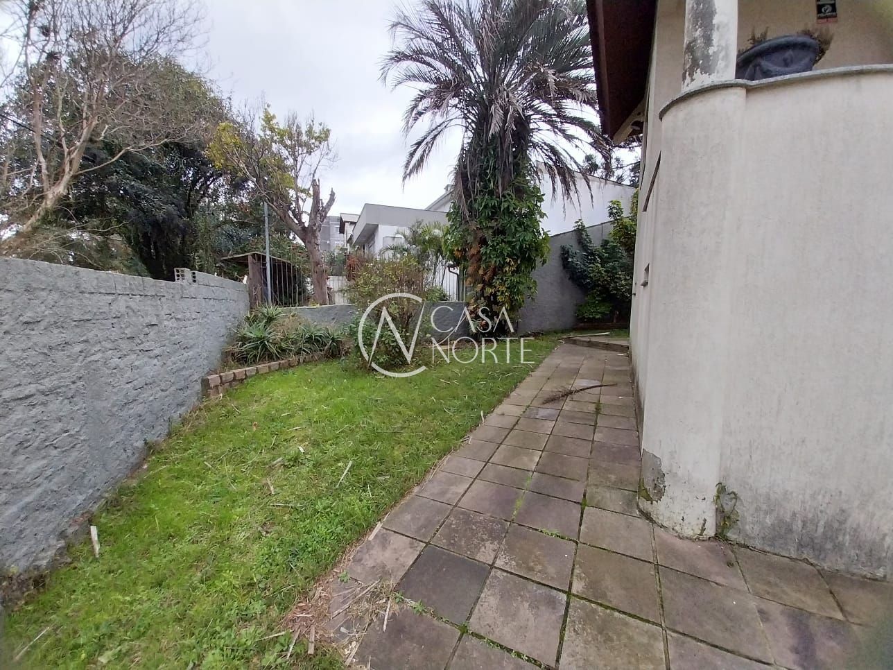 Casa à venda com 5 quartos, 304m², 2 vagas, Rua Banco do Comércio no bairro Santa Tereza em Porto Alegre