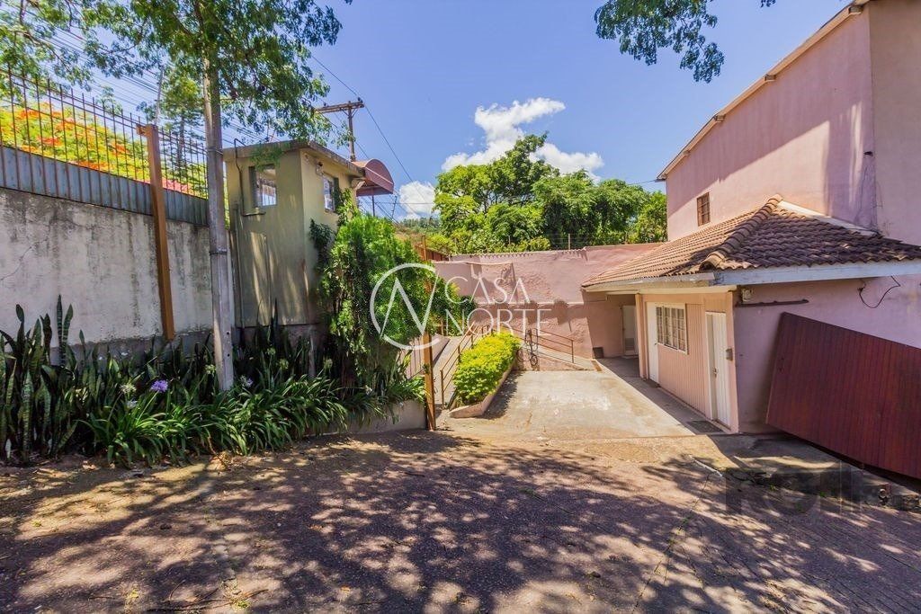 Casa à venda com 4 quartos, 1278m², 8 vagas, Avenida Professor Oscar Pereira no bairro Glória em Porto Alegre