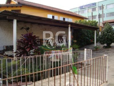 Casa à venda com 7 quartos, 312m², 2 suítes, 2 vagas, Avenida Ester no bairro Glória em Porto Alegre