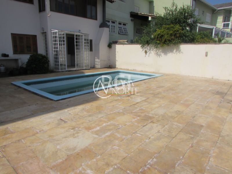 Casa de Condomínio à venda com 5 quartos, 383m², 2 suítes, 3 vagas, Rua Alcebiades Antônio dos Santos no bairro Nonoai em Porto Alegre