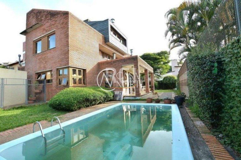 Casa à venda com 3 quartos, 276m², 1 suíte, 5 vagas, Rua de Souza Junior no bairro Medianeira em Porto Alegre