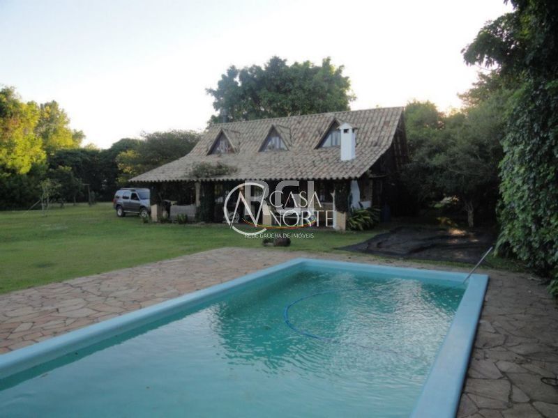 Casa à venda com 2 quartos, 130m², 5 vagas, Rua João Inácio da Silveira no bairro Arquipélago em Porto Alegre