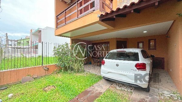 Casa à venda com 3 quartos, 130m², 1 suíte, 2 vagas, Rua Irany de Oliveira Santanna no bairro Hípica em Porto Alegre