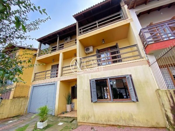Casa à venda com 5 quartos, 359m², 3 suítes, Rua Moacyr Godoy Ilha no bairro Espírito Santo em Porto Alegre