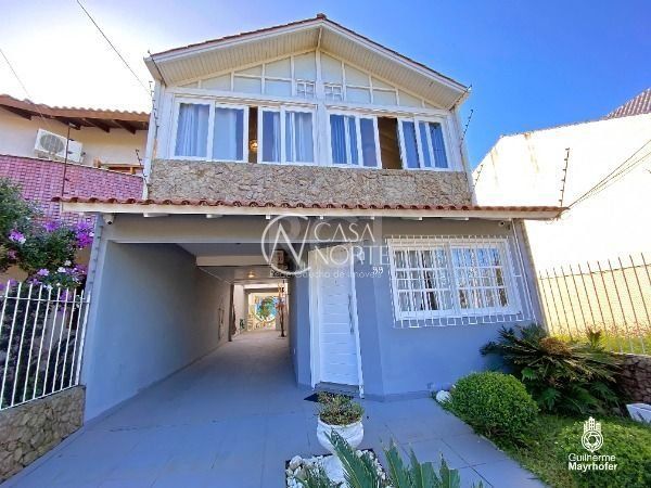 Casa à venda com 3 quartos, 183m², 1 suíte, 3 vagas, Rua Carlos Scliar no bairro Hípica em Porto Alegre