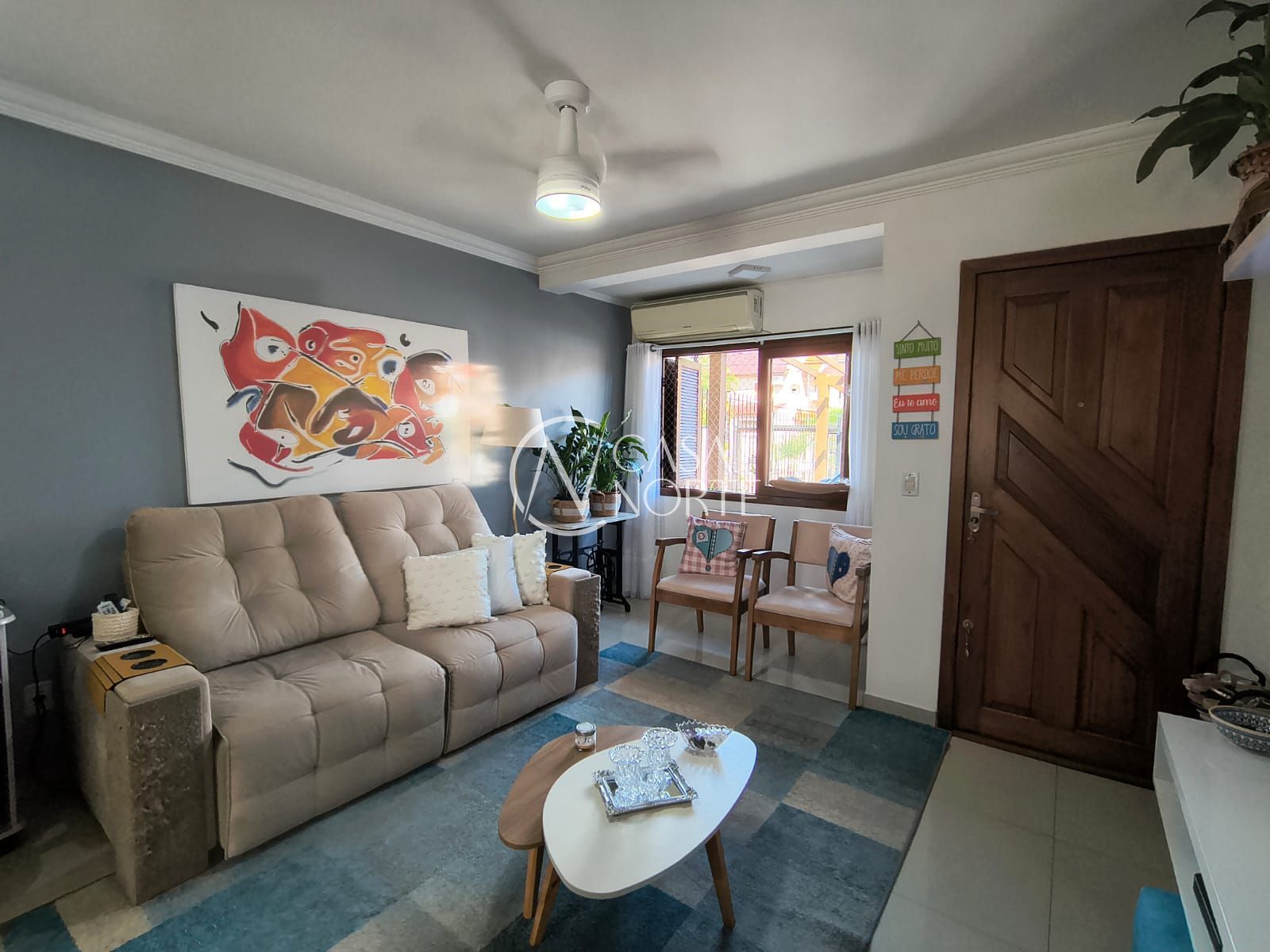 Casa à venda com 2 quartos, 77m², 2 suítes, 2 vagas, Rua Heitor Kramer no bairro Guarujá em Porto Alegre