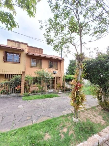 Casa de Condomínio à venda com 3 quartos, 190m², 1 suíte, 2 vagas, Rua Giorgio Negroni no bairro Espírito Santo em Porto Alegre