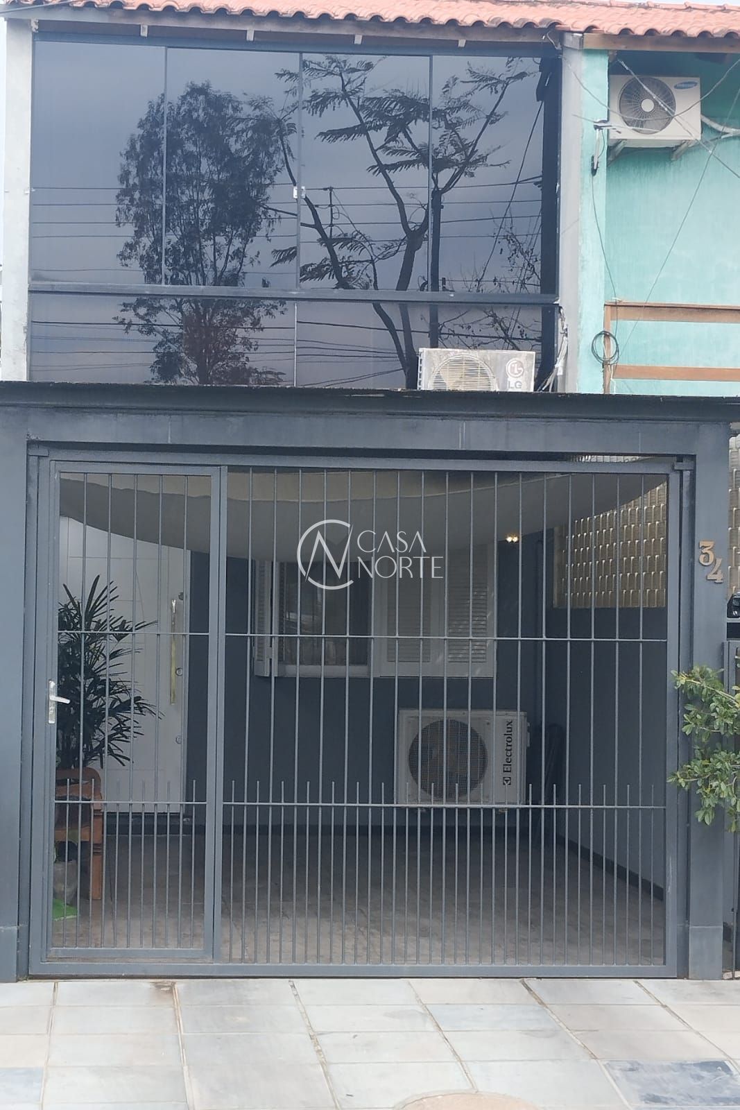 Casa à venda com 2 quartos, 80m², 1 vaga, Rua Eva Vargas Soares no bairro Hípica em Porto Alegre