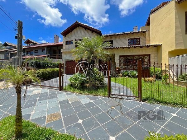 Casa à venda com 3 quartos, 340m², 3 suítes, 4 vagas, Rua Engenheiro Renato Costa Leite no bairro Ipanema em Porto Alegre