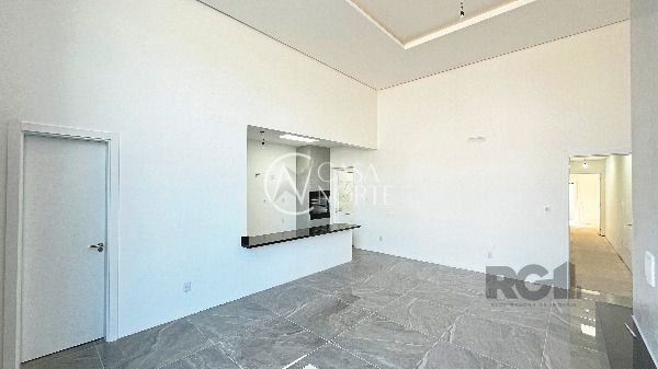 Casa de Condomínio à venda com 3 quartos, 111m², 1 suíte, 2 vagas, Rua Carlos Maximiliano Fayet no bairro Hípica em Porto Alegre