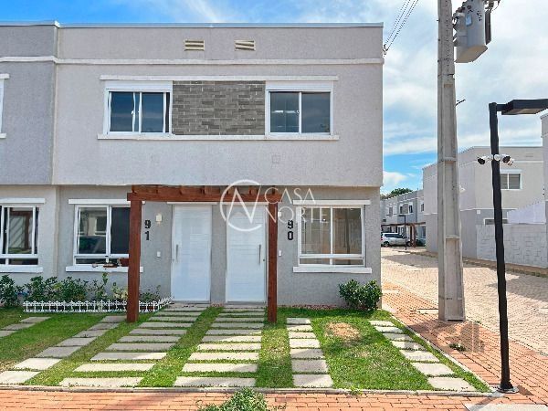 Casa à venda com 2 quartos, 87m², 1 vaga, Estrada Cristiano Kraemer no bairro Vila Nova em Porto Alegre