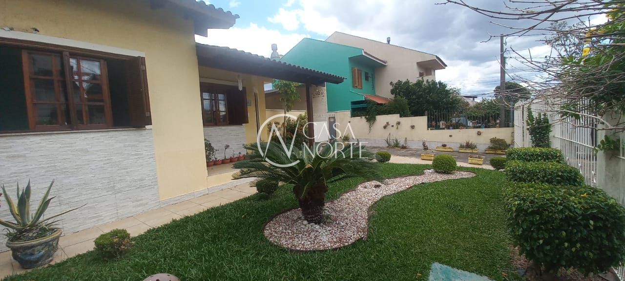 Casa à venda com 3 quartos, 167m², 1 suíte, 4 vagas, Rua Heitor Kramer no bairro Guarujá em Porto Alegre