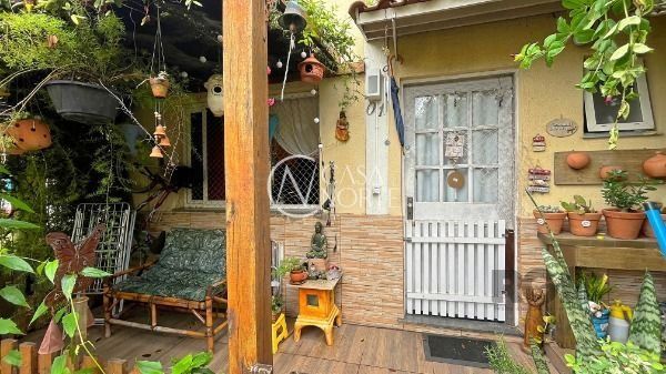 Casa à venda com 2 quartos, 118m², 2 vagas, Avenida Edgar Pires de Castro no bairro Aberta dos Morros em Porto Alegre